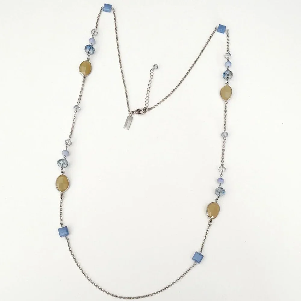 Long silver necklace with blue and yellow glass beads